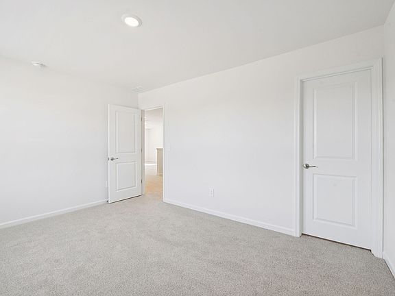 Secondary bedroom in the Sherwood floorplan at a Meritage Homes community in Raleigh, NC.