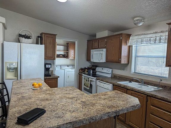 5th image of 12223 E 37th Pl
