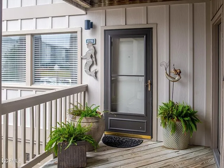 6119 Harbourside Dr — Photo 2