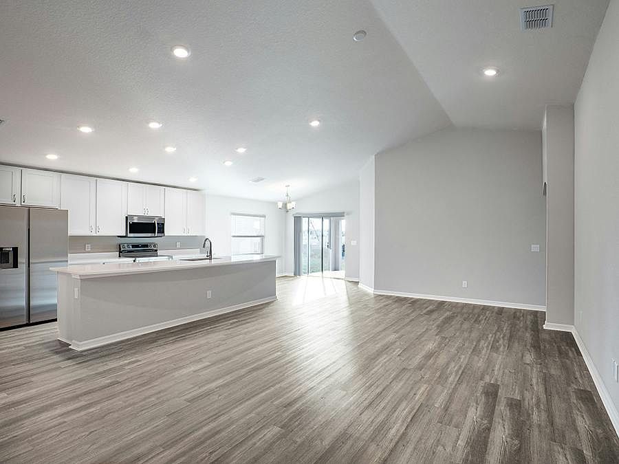 Sunny, open-layout, 4-bedroom home for sale in Parrish, Florida, on a premium waterfront homesite!