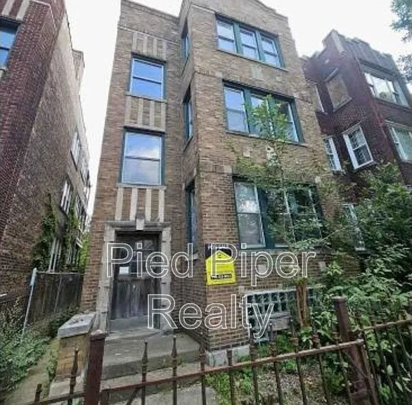 7825 S Yates Ave — Photo 1