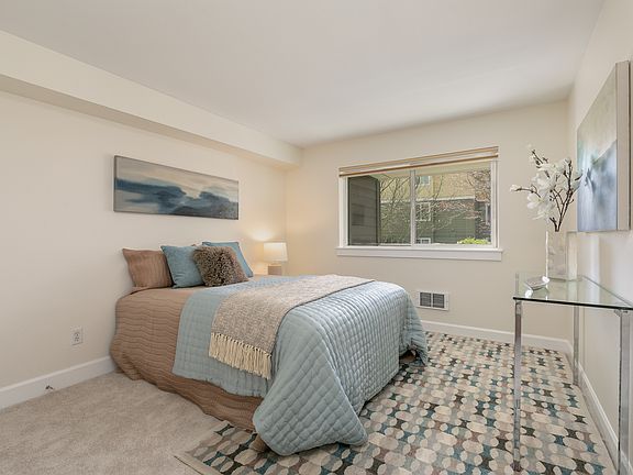 Large bedroom featuring abundant natural light.