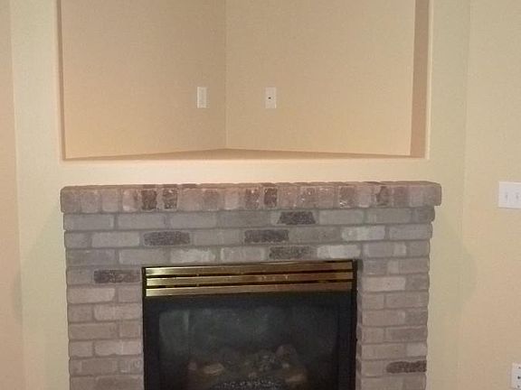 Gas fireplace with TV shelf