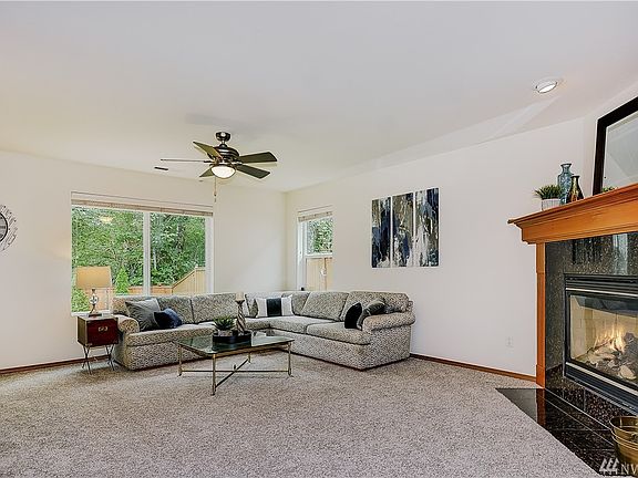 Large living/family room ... all new carpets throughout + beautiful gas fireplace!