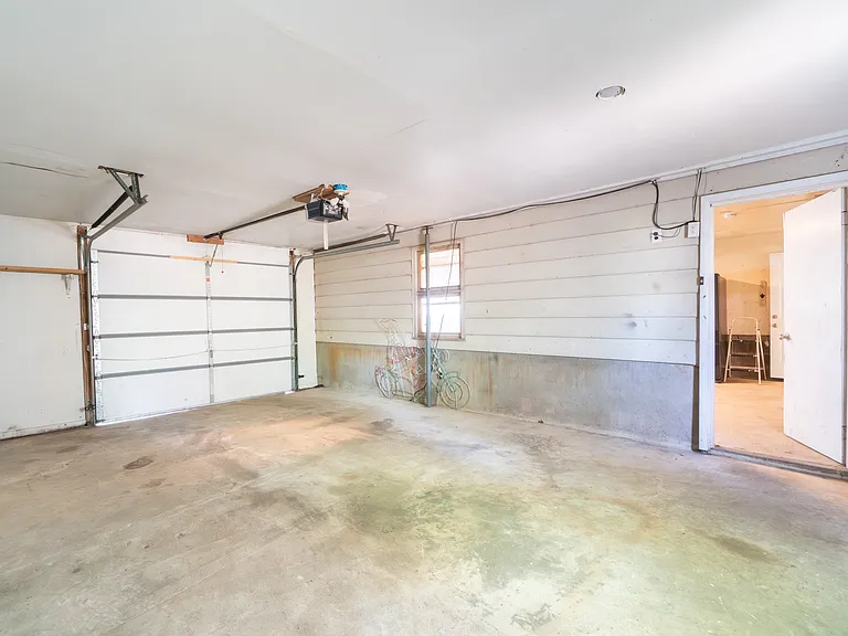2 separate garages with automatic doors