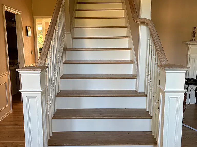 Stairs to 2nd floor (all newly finished hardwood floor on 1st level, staircase and 2nd level hallway)