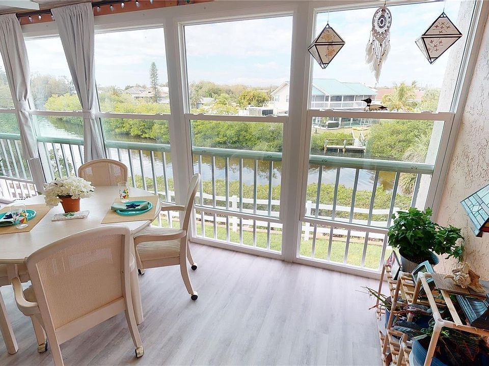 Lanai under air with views of curry creek