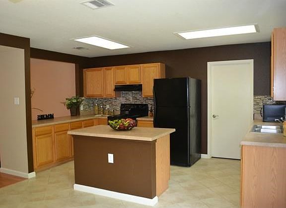 Amazing amount of counter and cabinet space in this huge kitchen!