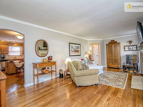 Freshly painted, beautiful hardwood floors and a wood burning fireplace! What a great living room!