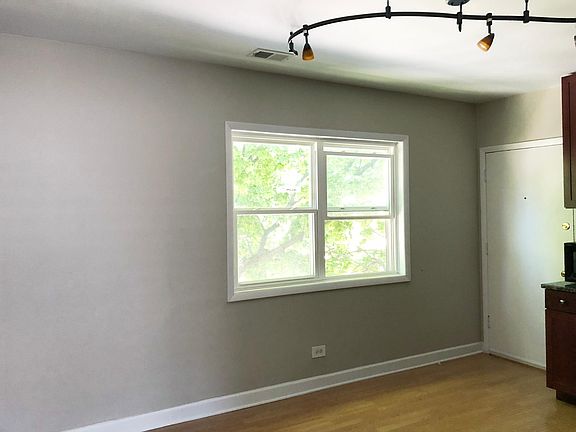 Kitchen 15' x 12' - Exit door to Washtenaw Ave. Gas Stove, Dishwasher, Microwave, and Garbage Disposal.