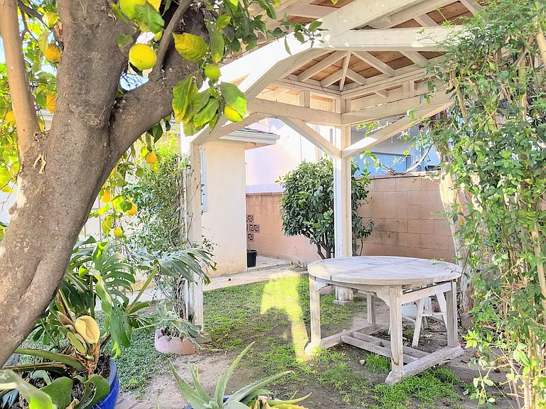 Pergola and seating area.