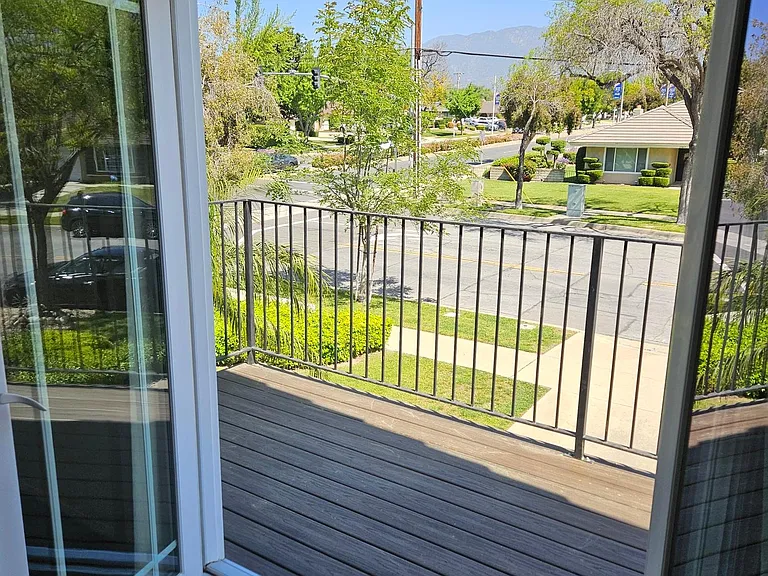 master bedroom with balcony view