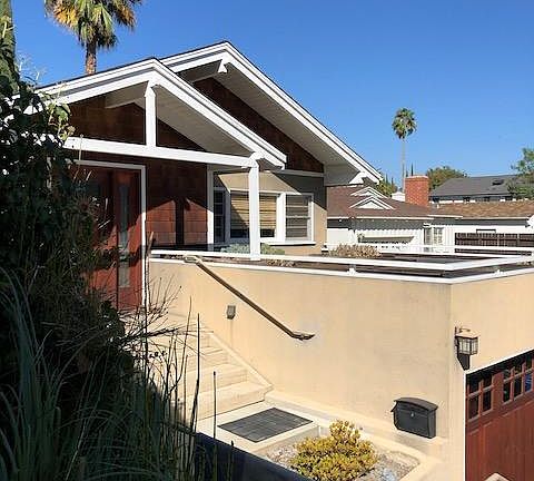 Front of house- overview from rock garden