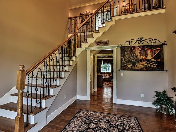  Wrought iron spindles, fresh paint and double ceilings are sure to impress.