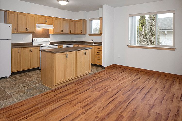 The island allows for additional counterspace as well as storage.