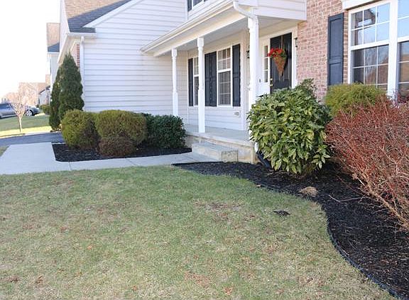 Beautifully landscaped complete with front porch