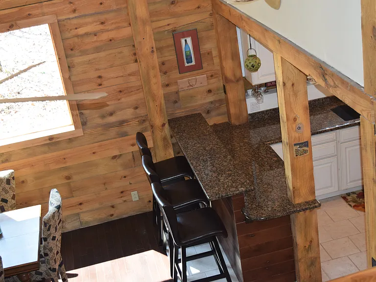 Granite counter tops with raised bar sitting area