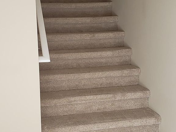 Stairs from Entryway to Condo