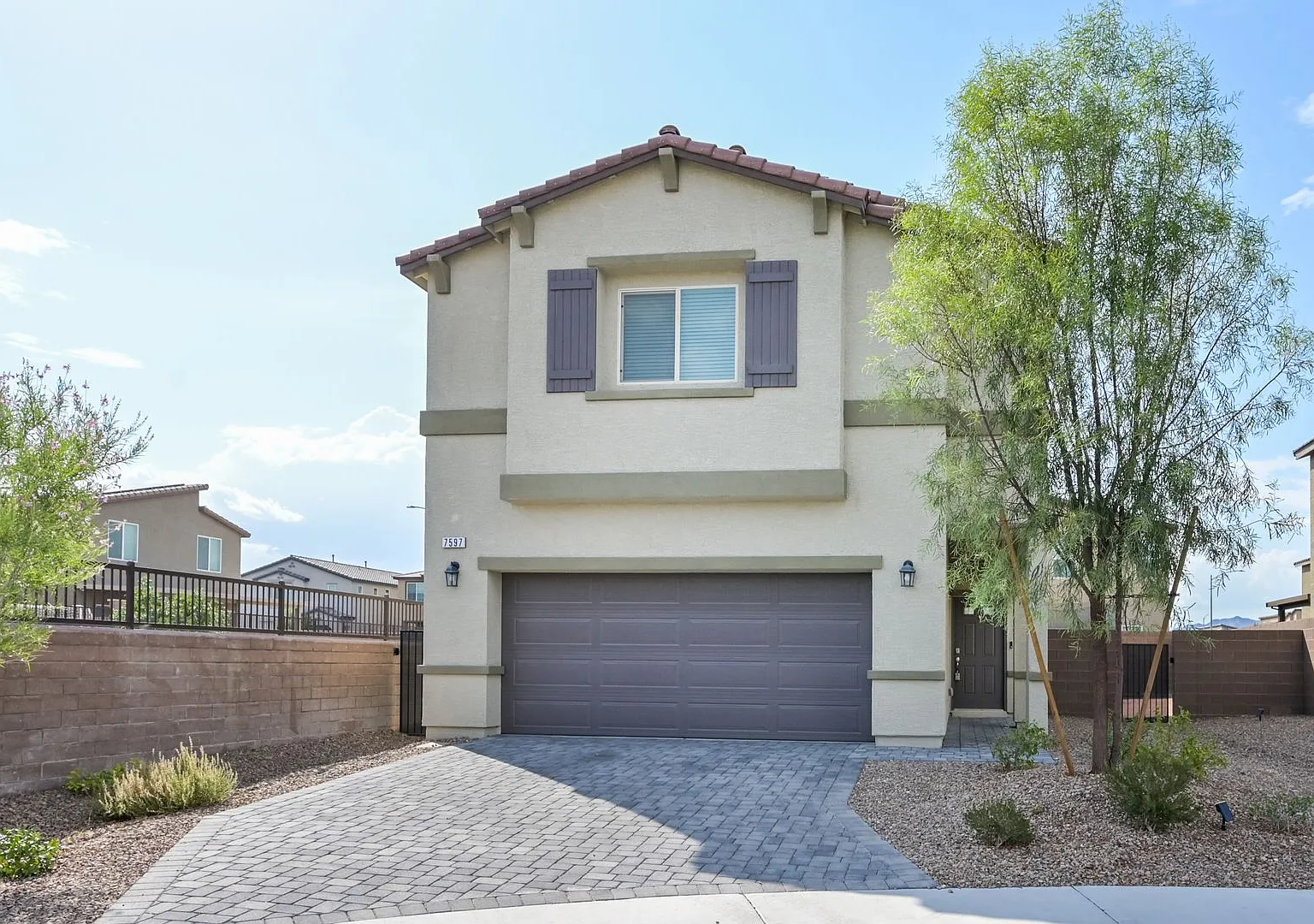 NW!! Gated!! Built 2023 Corner Lot!! Low Maintenance Desert Landscape Front!! Patio & Synthetic G... — Photo 2