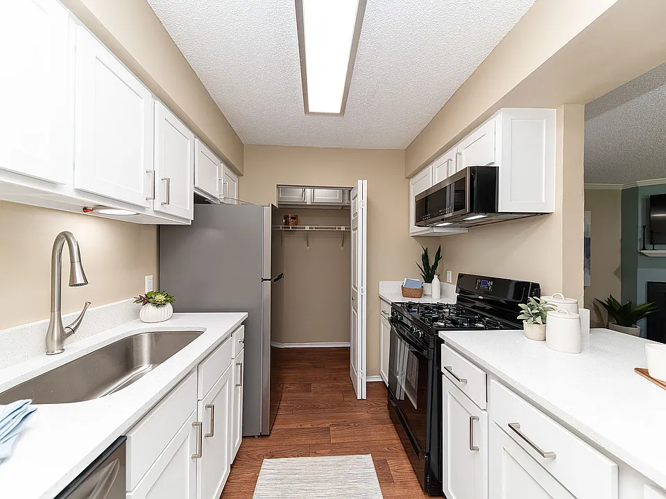 Kitchen with quartz counters and modern cabinetry.