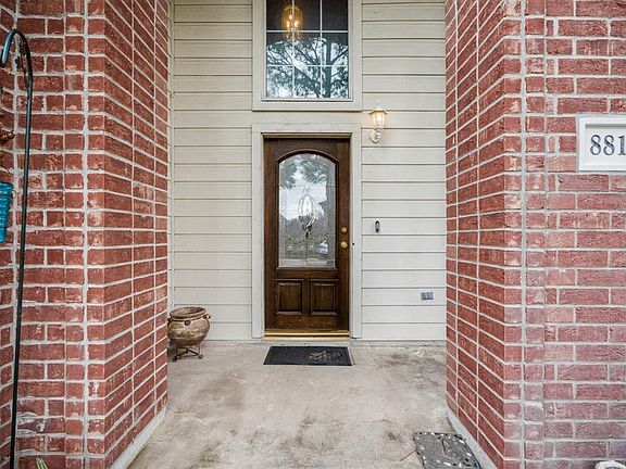 A great covered front porch, as you walk up to the front door of the home.