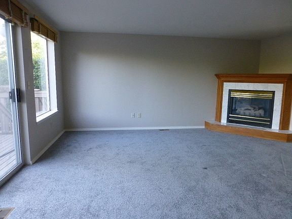 Two gas fireplaces: formal living and Family room off kitche