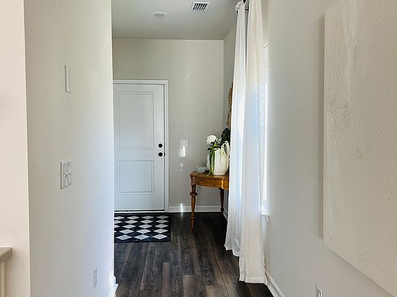 Entryway Hallway (Garage Entry/Exit to the left)