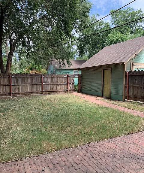 View of privacy fenced backyard