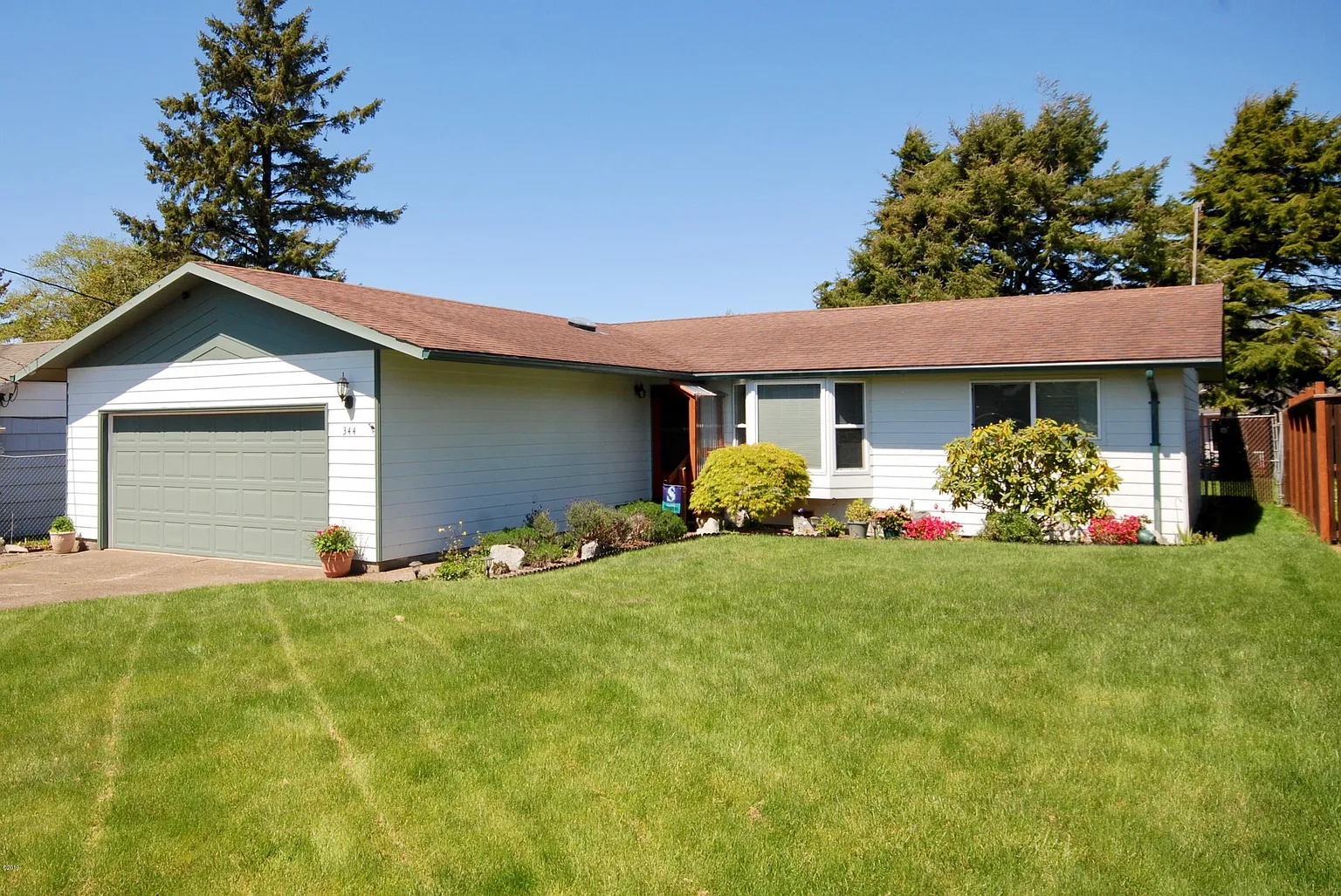344 NE San Bayo Cir #O photo 1