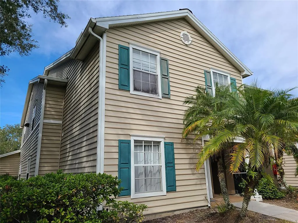 Building Photo - 8911 Manor Loop #205