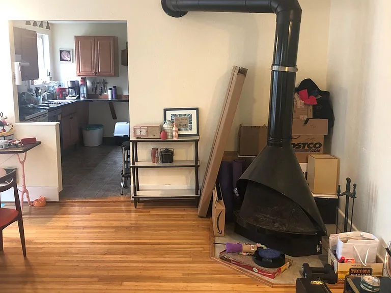 Wood stove and kitchen - taken from Living Room