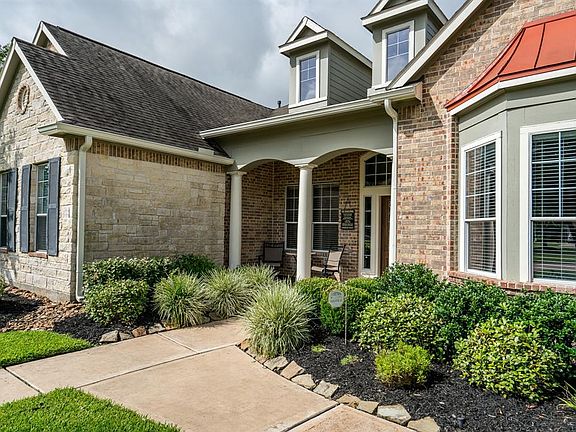 Walk up the sidewalk to this cozy covered front porch! Imagine spending your morning sipping on a cup of coffee enjoying the serenity of this wonderful neighborhood!