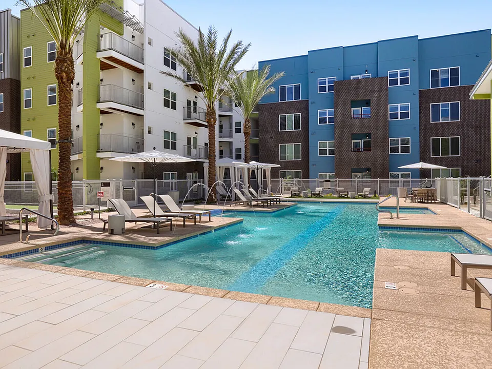 Sun, swim, and socialize. The Garrett Uptown resort pool offers sparkling blue water, shaded cabanas, and plenty of loungers, making it easier to escape at home in Chandler, Arizona.