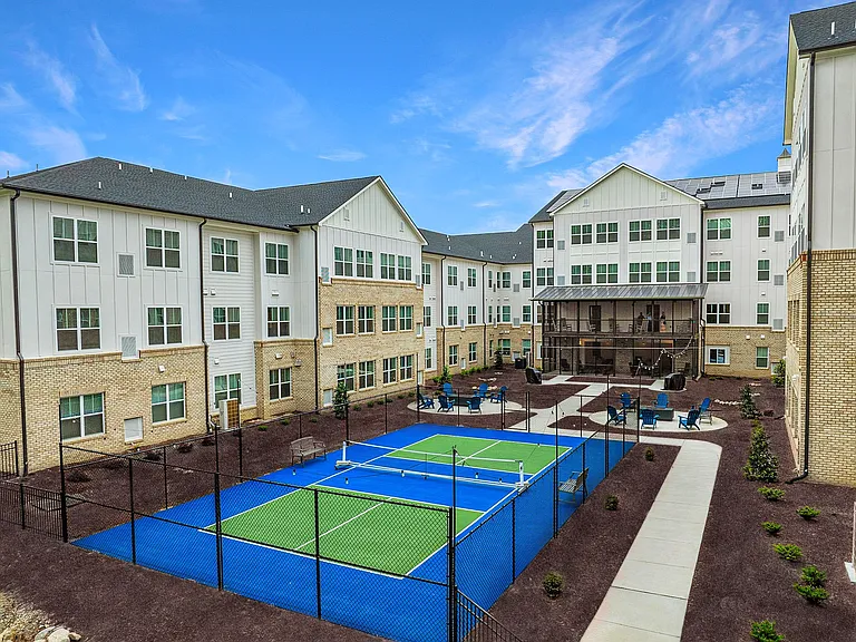 Active Adult birds eye view of courtyard and pickleball courts