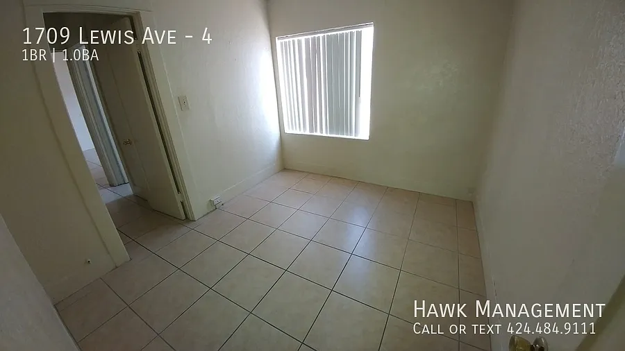 Building Photo - 1709 Lewis Ave #4