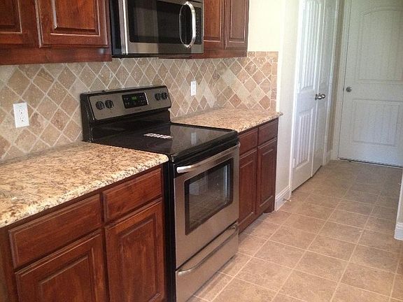 Stainless appliances, custom cabinets