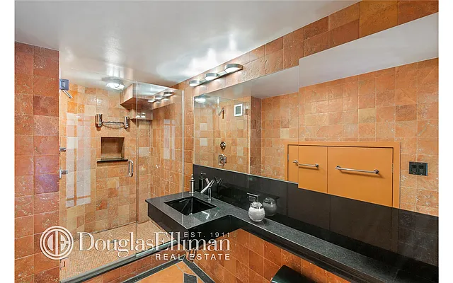 Sold by Douglas Elliman | media 13