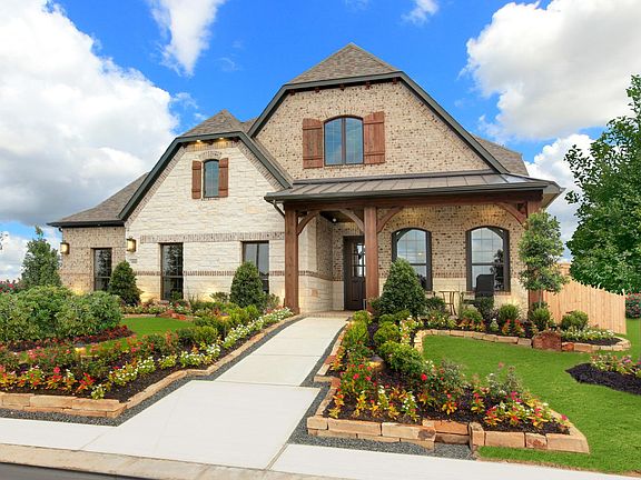 Custom home with brick and stone exterior