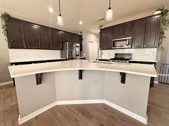 Kitchen, with a huge bar island.