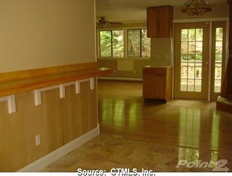 kitchen opens to dining area