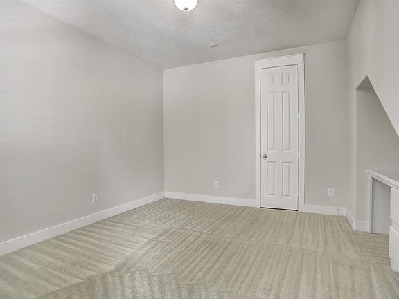 First floor bedroom with built in desk