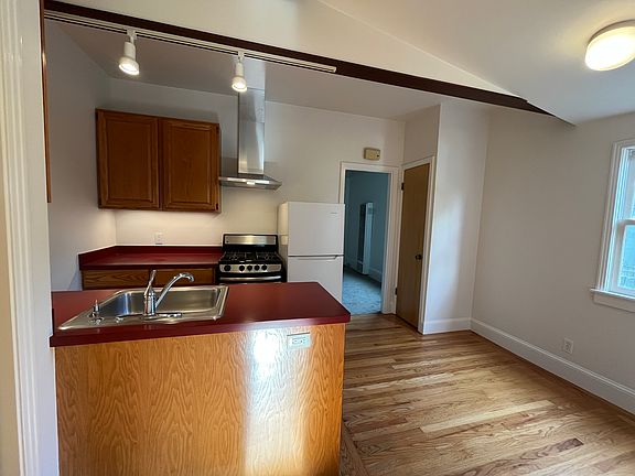 kitchen, looking from bedroom door into living room.