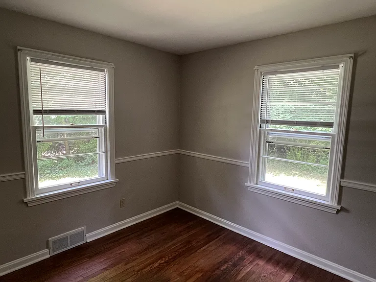 Downstairs bedroom 1 has two large windows.