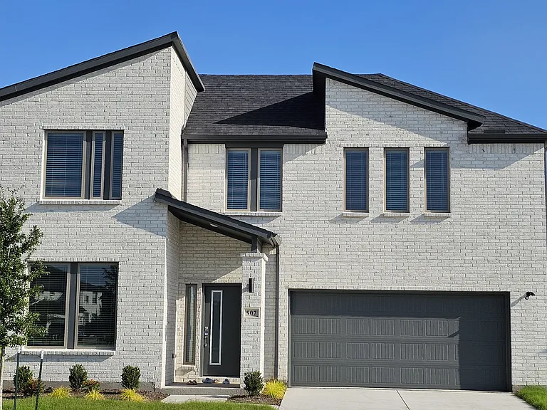 A closer look at the elegant stone and brick detailing that sets this home apart