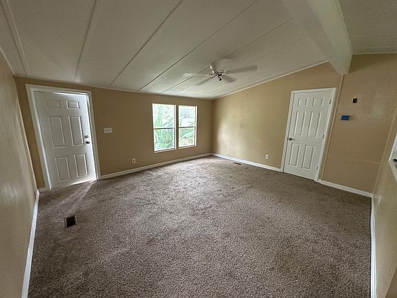 Living Room view from the front door, the other door is to the Master Bedroom