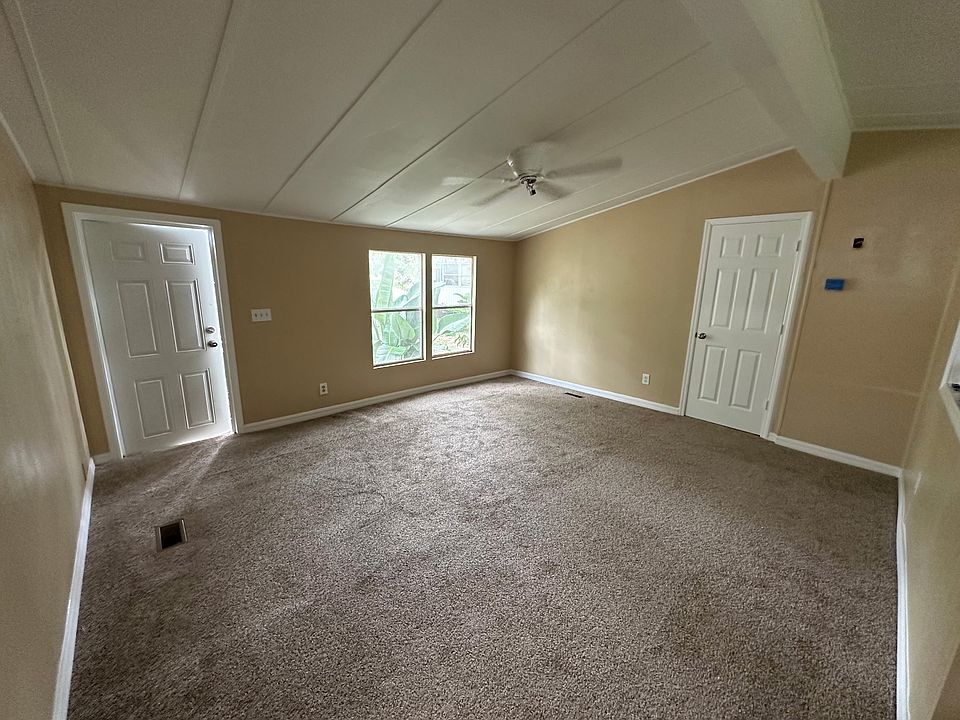Living Room view from the front door, the other door is to the Master Bedroom