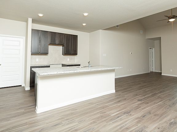 Dining Area to Kitchen and Family Room