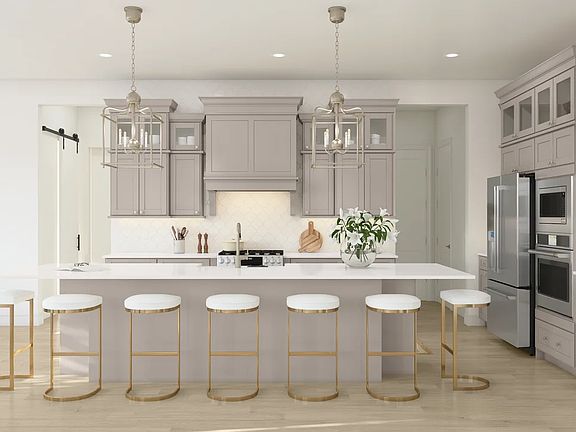 Kitchen with upper glass cabinets pendant lights