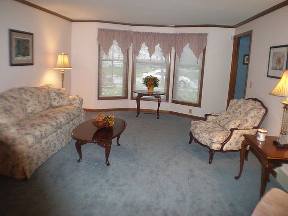 Large living room with bay window area