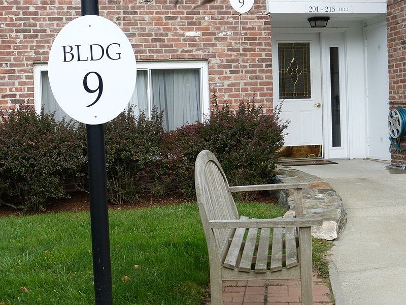 Great Opportunity in the Coveted Southport Woods Condominiums: A 1st Floor Three Bedroom End Unit